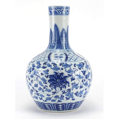 593 - Chinese blue and white porcelain vase, finely hand painted with flower heads and foliate scrolls, 33... 