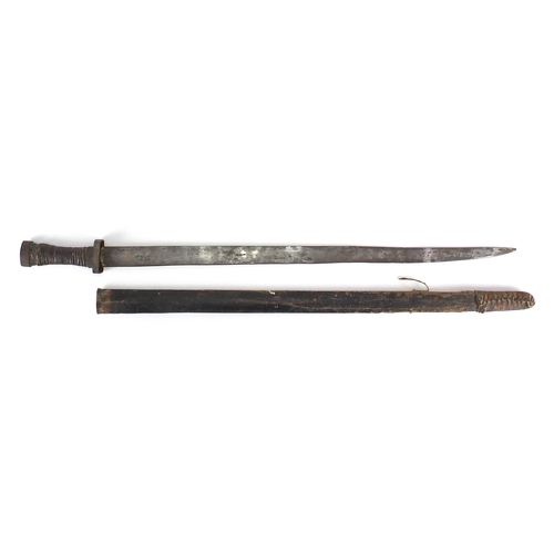 579 - Military interest sword with scabbard and steel blade, 88cm in length