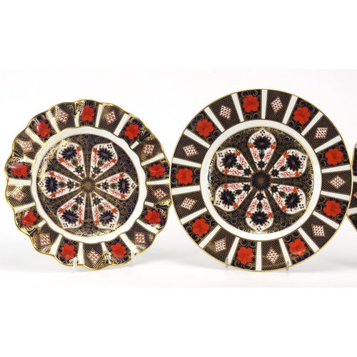 2272 - Three Royal Crown Derby old Imari plates, including an octagonal example, the largest 23.5cm in diam... 