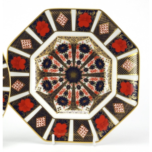 2272 - Three Royal Crown Derby old Imari plates, including an octagonal example, the largest 23.5cm in diam... 