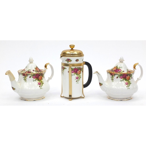 2100 - Royal Albert Old Country Roses cafetiere together with two matching teapots, the largest 24.5cm high