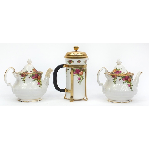 2100 - Royal Albert Old Country Roses cafetiere together with two matching teapots, the largest 24.5cm high