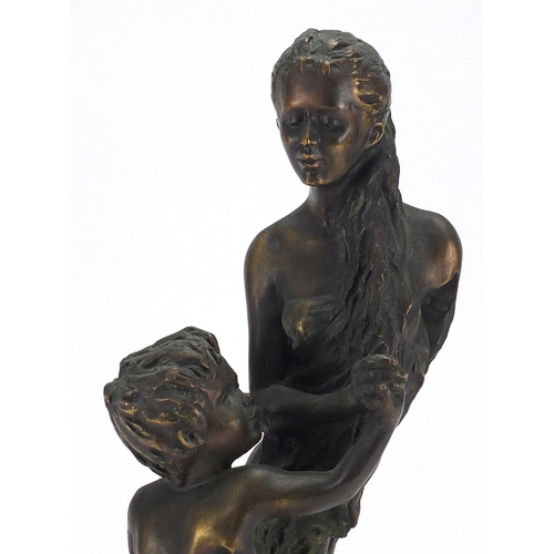 2087 - Andre Paor - Mujery Nino, bronze study of a mother and child on a square black marble base, overall ... 