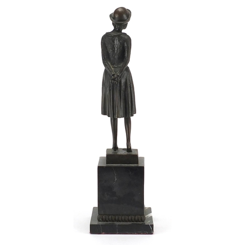 2086 - After Chiparus - Bronze study of an Art Deco female, with French plaque on black slate and marble ba... 