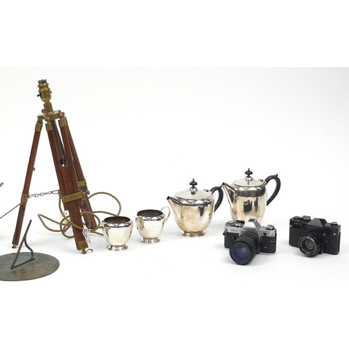 197 - Box of items including silver plated tea service, copper measures, sundial, vintage cameras and a tr... 