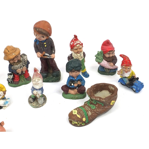 150 - Collection of mostly stoneware painted garden gnomes, the largest 51cm high