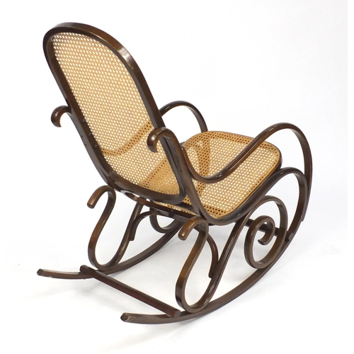 79 - Bentwood rocking chair with cane back and seat