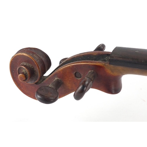 235 - Old wooden violin, bearing a Stradiuarius label