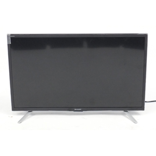 111 - Sharp 24inch LCD television, with remote