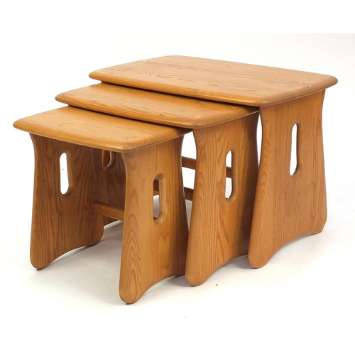 2027 - Ercol light elm nest of three occasional tables, the largest 45cm H x 62.5cm W x 40.5cm D