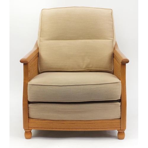 2030 - Ercol light elm bergere armchair with beige upholstered cushions, 80cm H x 79cm W x 90cm D