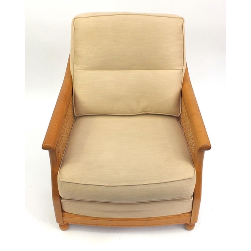 2030 - Ercol light elm bergere armchair with beige upholstered cushions, 80cm H x 79cm W x 90cm D
