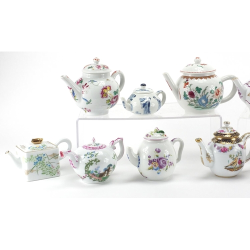 2178 - Victoria and Albert Museum porcelain teapot collection comprising twelve teapots including Kangxi, W... 