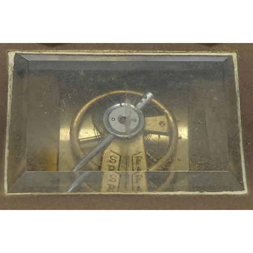 2134 - Brass cased carriage clock with bevelled glass sides and enamelled dial, 12cm high