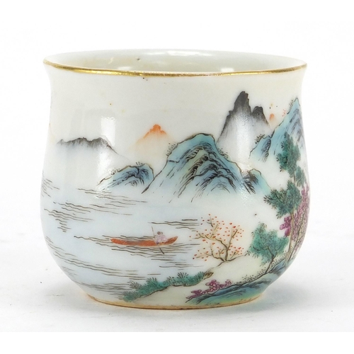 641 - Chinese porcelain plate together with a famille rose tea cup, finely hand painted with a mountain la... 