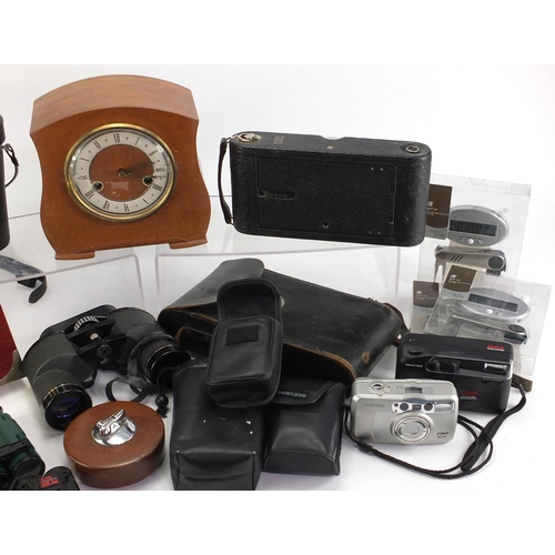 212 - Box of cameras, binoculars and mantel clocks etc