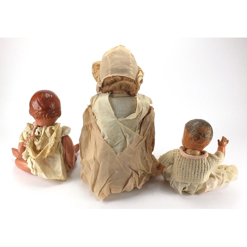 200 - Three vintage dolls, the largest  68cm in length