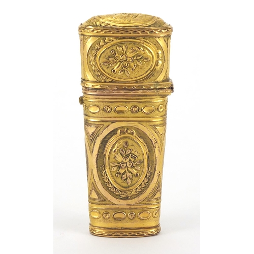 4 - 18th century gilt repoussé etui decorated with panels of flowers, the fitted interior housing implem... 