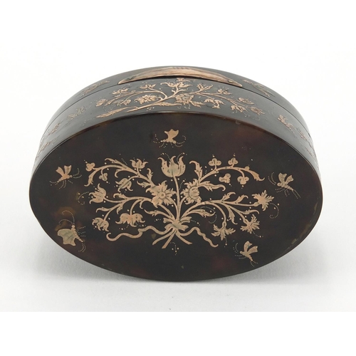 14 - 18th century oval tortoiseshell and gold pique work snuff box, decorated with floral sprays and bird... 