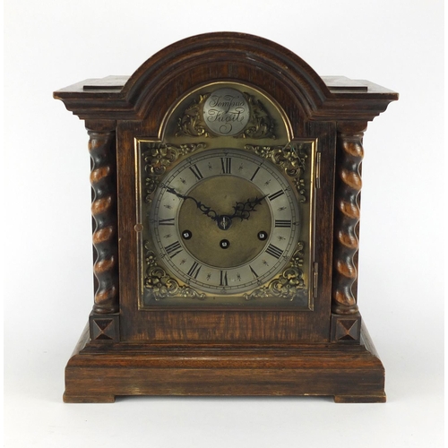 Oak cased Junghans Tempus Fugit bracket clock with silvered