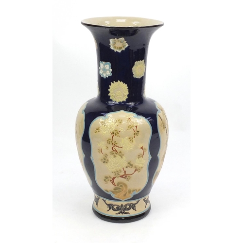 2047 - Large floor standing Chinese porcelain vase, hand painted with panels of flowers, 69cm high