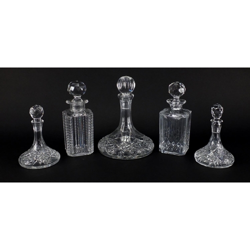 2107 - Five cut glass decanters including three ship design and an Edinburgh Crystal example with faceted s... 