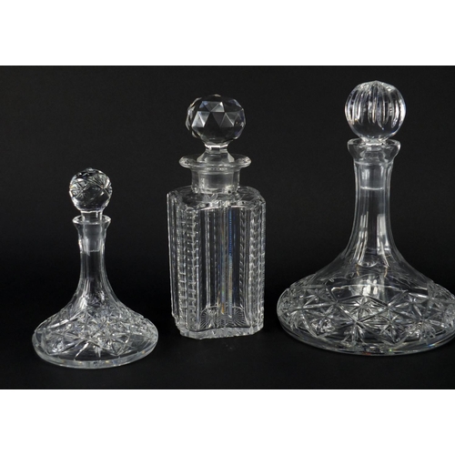 2107 - Five cut glass decanters including three ship design and an Edinburgh Crystal example with faceted s... 