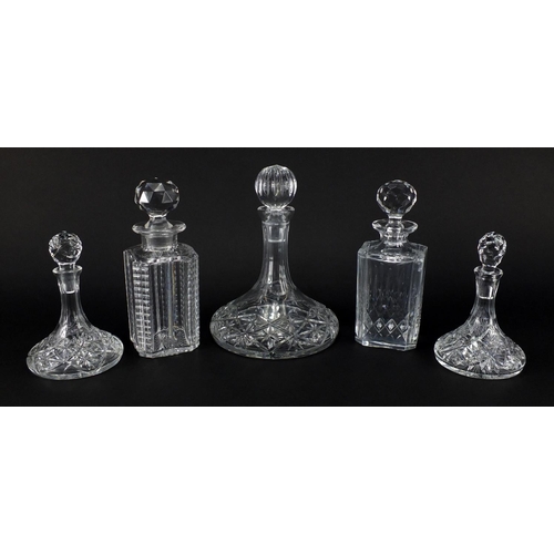 2107 - Five cut glass decanters including three ship design and an Edinburgh Crystal example with faceted s... 