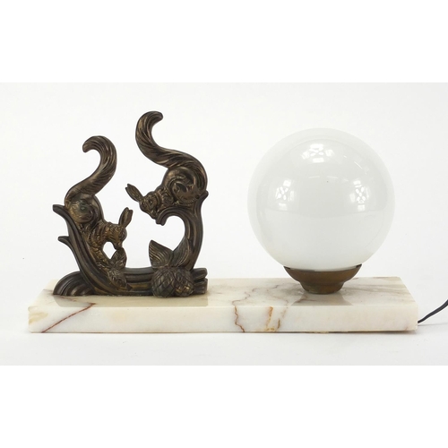 2104 - Art Deco white marble desk lamp with globular glass shade, mounted with two bronzed squirrels, 30.5c... 