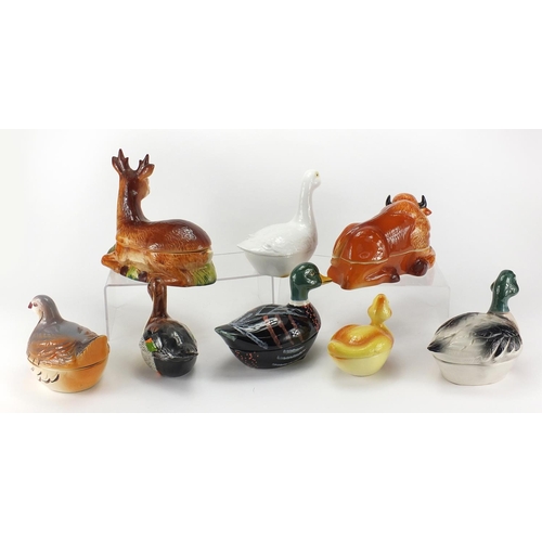 2114 - Eight Michel Caugant hand painted porcelain pots and covers in the form of various animals, the larg... 