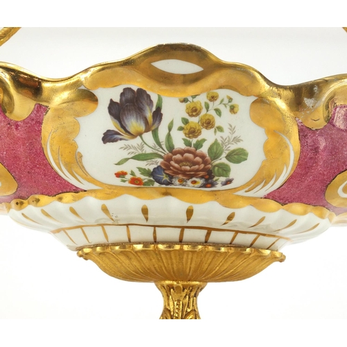 2191 - Ornate porcelain centrepiece with gilt metal pedestal and twin handles, decorated with flowers, 56cm... 