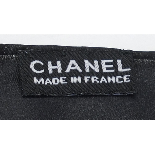 2065 - Square Chanel silk scarf, having an all over aeroplane design with box, 130cm x 130cm