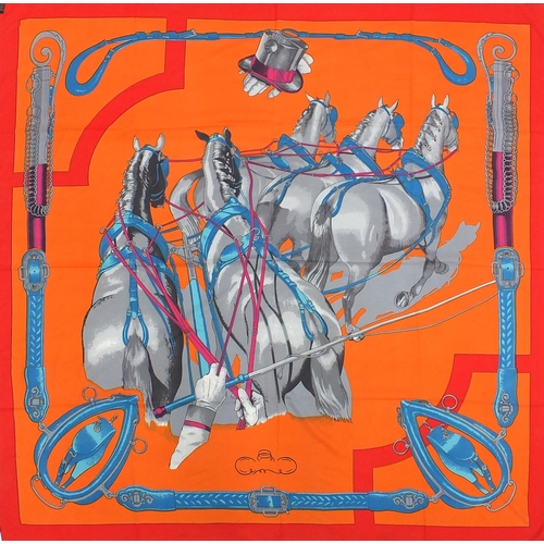 2068 - Rectangular Hermes silk scarf, having a horse design with  box, 130cm x 130cm