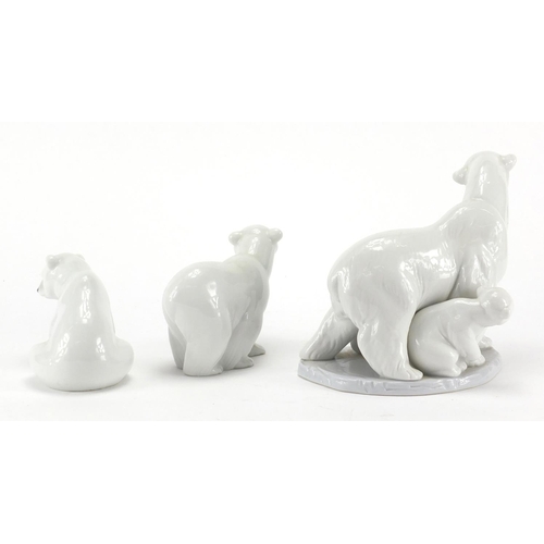 2279 - Lladro polar bear group and two others, the largest with box and 16.5cm high