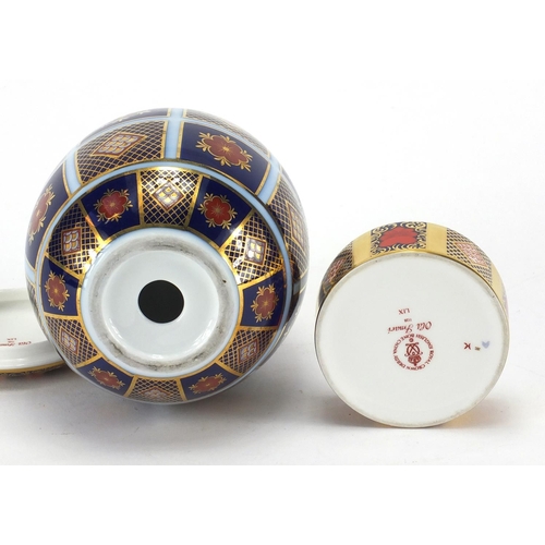 2275 - Royal Crown Derby old Imari patterned pot and cover, with gold block design together with similar eg... 