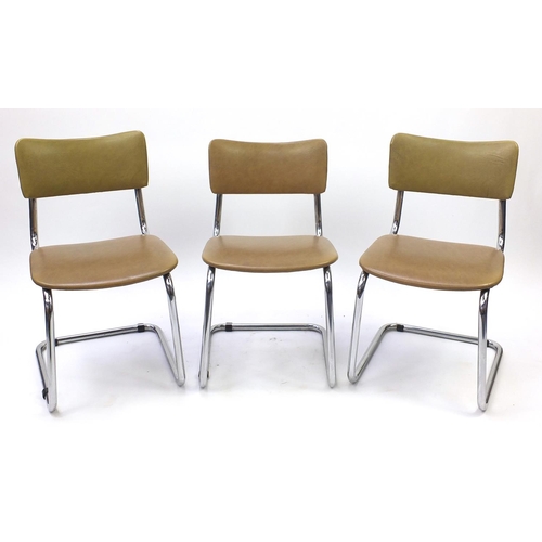 2038 - Three Marcel Breuer style chrome and brown leatherette chairs, 74cm high