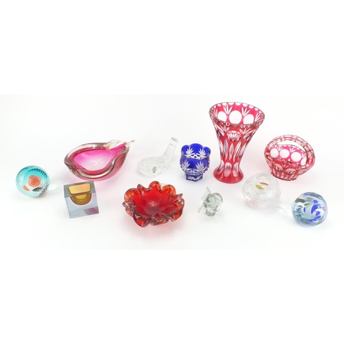 2302 - Colourful glassware including flashed cut glass vases, Caithness Bluebell paperweight and a Waterfor... 