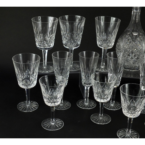 2225 - Waterford Crystal including drinking glasses and a decanter, the largest 32cm high