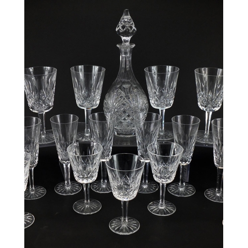 2225 - Waterford Crystal including drinking glasses and a decanter, the largest 32cm high