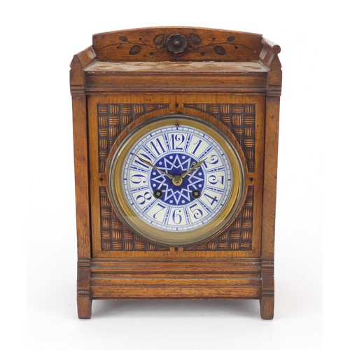 2164 - Japy Freres carved oak striking mantel clock, with enamelled dial, 28cm high