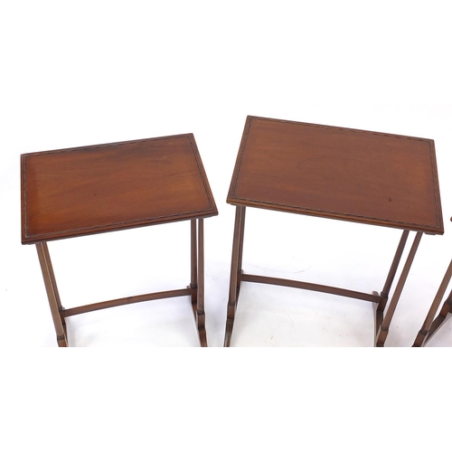 2041 - Nest of three Edwardian mahogany occasional tables with spindle turned legs, the largest 70cm H x 53... 