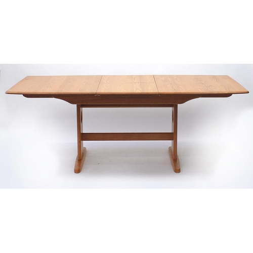 2025 - Ercol light elm extending dining table, 73cm H x 150cm W x 92cm D