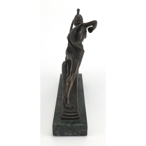 2139 - Bronze study of an Art Deco figure with a longbow, raised on a green marbleised base, with indistinc... 