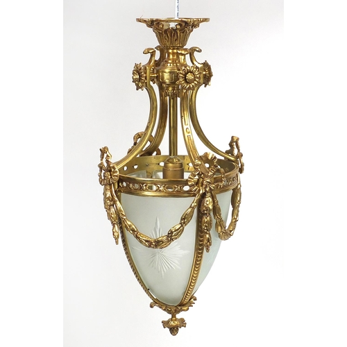 2151 - Ornate gilt brass and glass light fitting with acorn finial, 58cm high