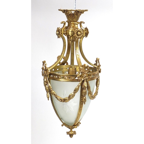 2151 - Ornate gilt brass and glass light fitting with acorn finial, 58cm high