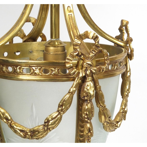 2151 - Ornate gilt brass and glass light fitting with acorn finial, 58cm high