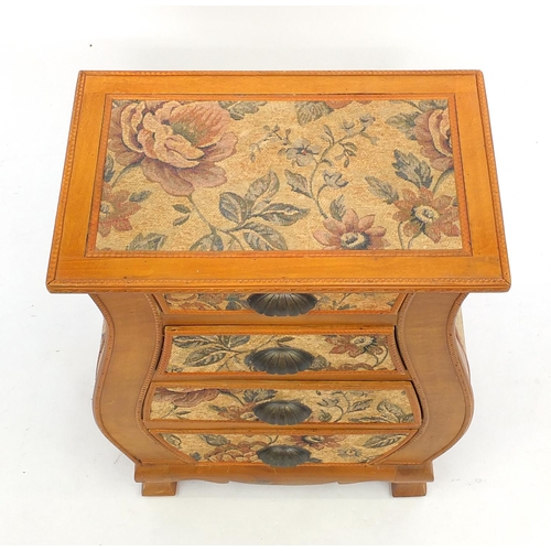 114 - Light wood four drawer bedside chest, decorated with floral fabric, 61cm H x 50cm W x 32cm D