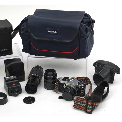 217 - Vintage Pentax ME Super camera with lenses and accessories together with a polaroid camera