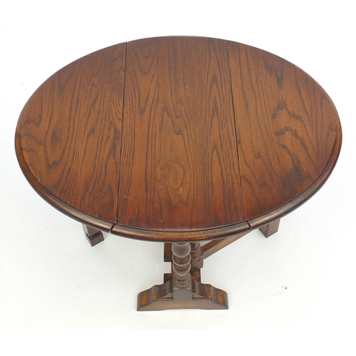 58 - Oak Sutherland table, 51cm high