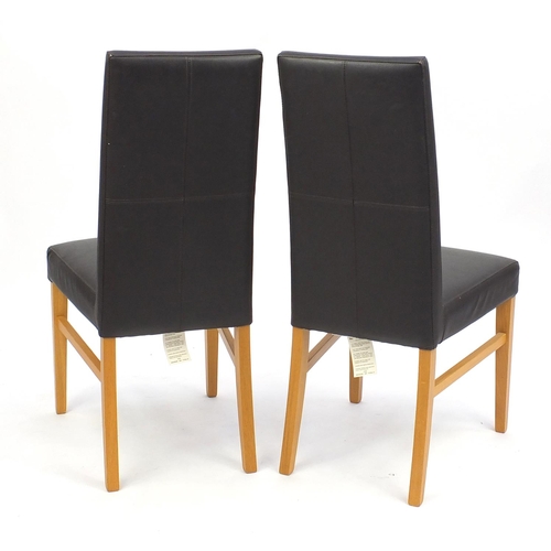 116 - Pair of brown leather and light wood chairs, 100cm high